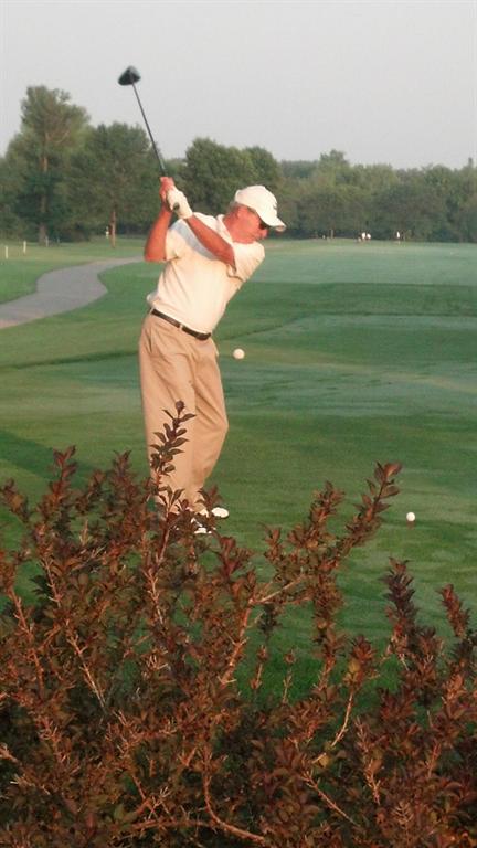 Tom Rezler en route to the overall champion hits his approach to #12.